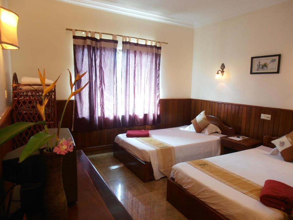 Firefly Guesthouse - The Berlin Angkor سيام ريب الغرفة الصورة